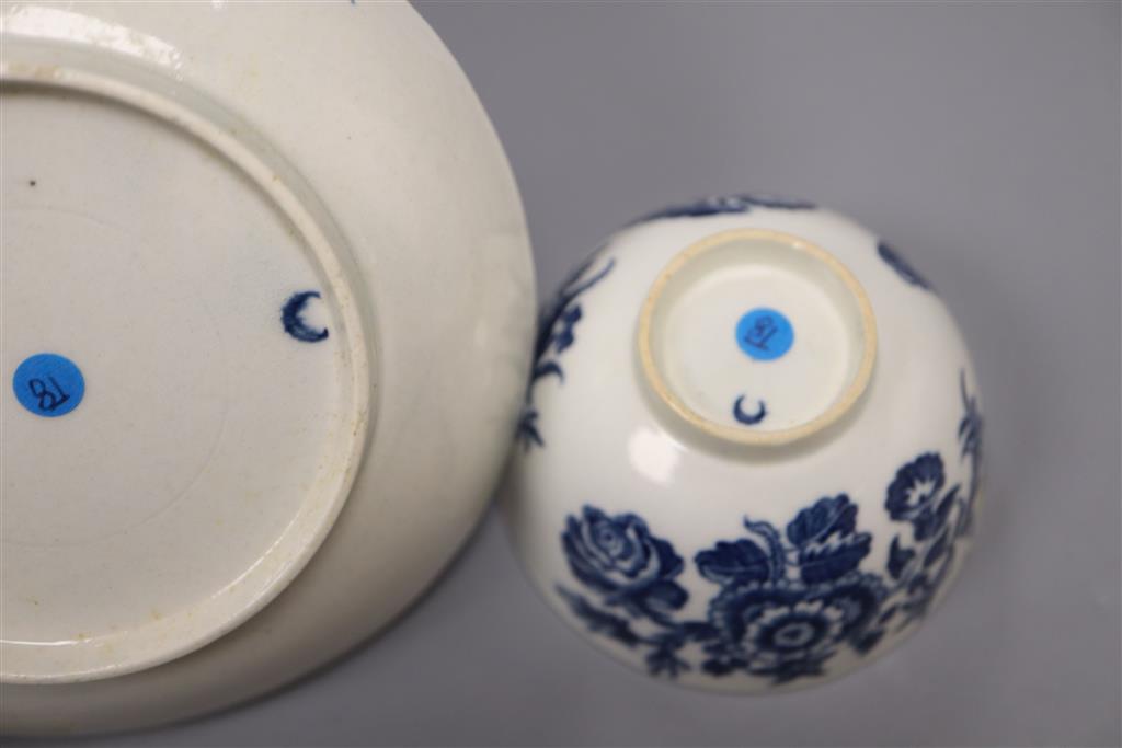 A group of Worcester Three Flowers tea wares, c.1775, comprising two tea bowls and saucers and a sparrow beak milk jug